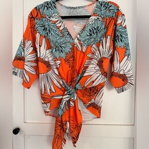 3/4 length wide flowy sleeve front tie blouse